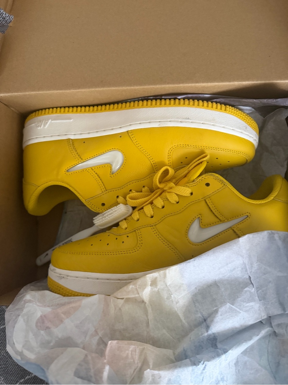 Nike Kids Yellow Low-Top Sneakers with White Swoosh